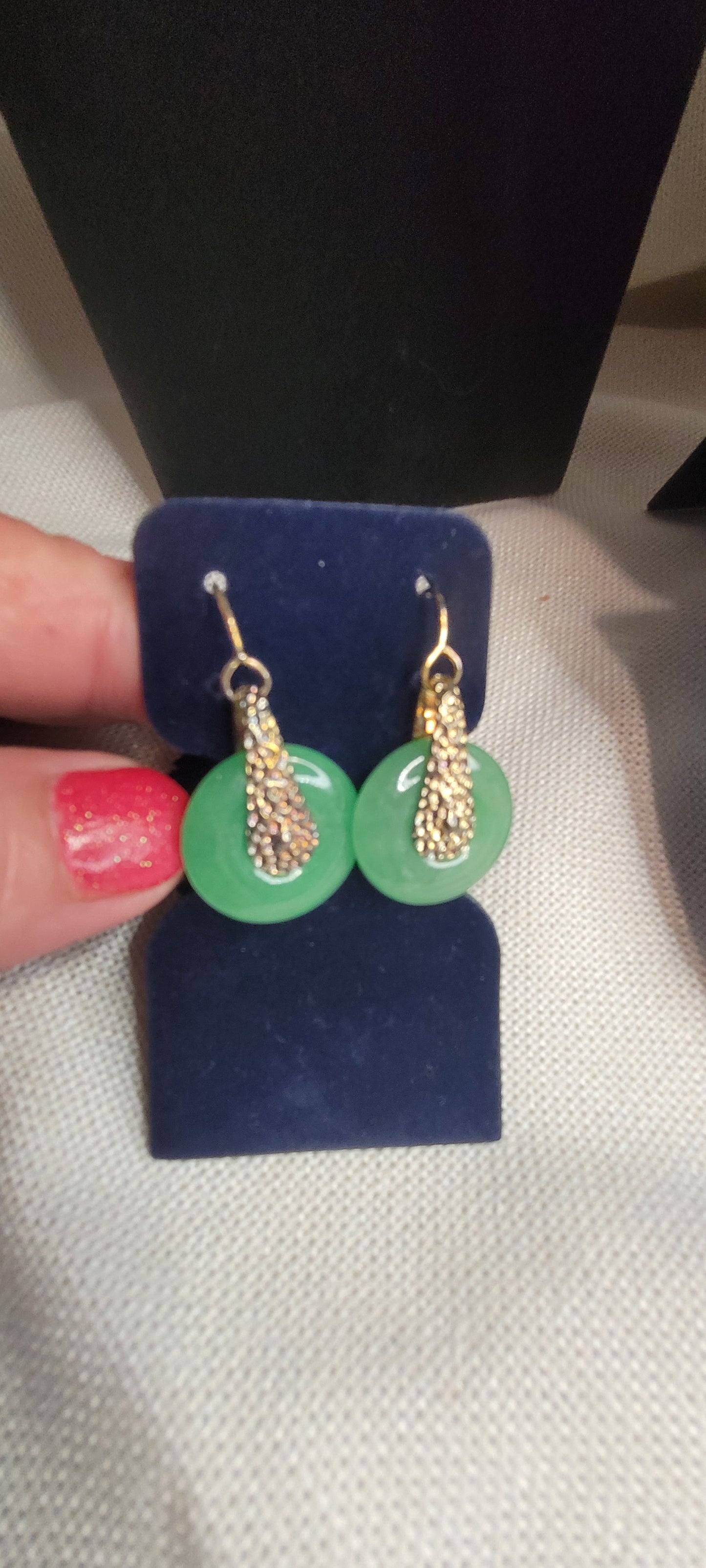 Jade and gold tone earrings