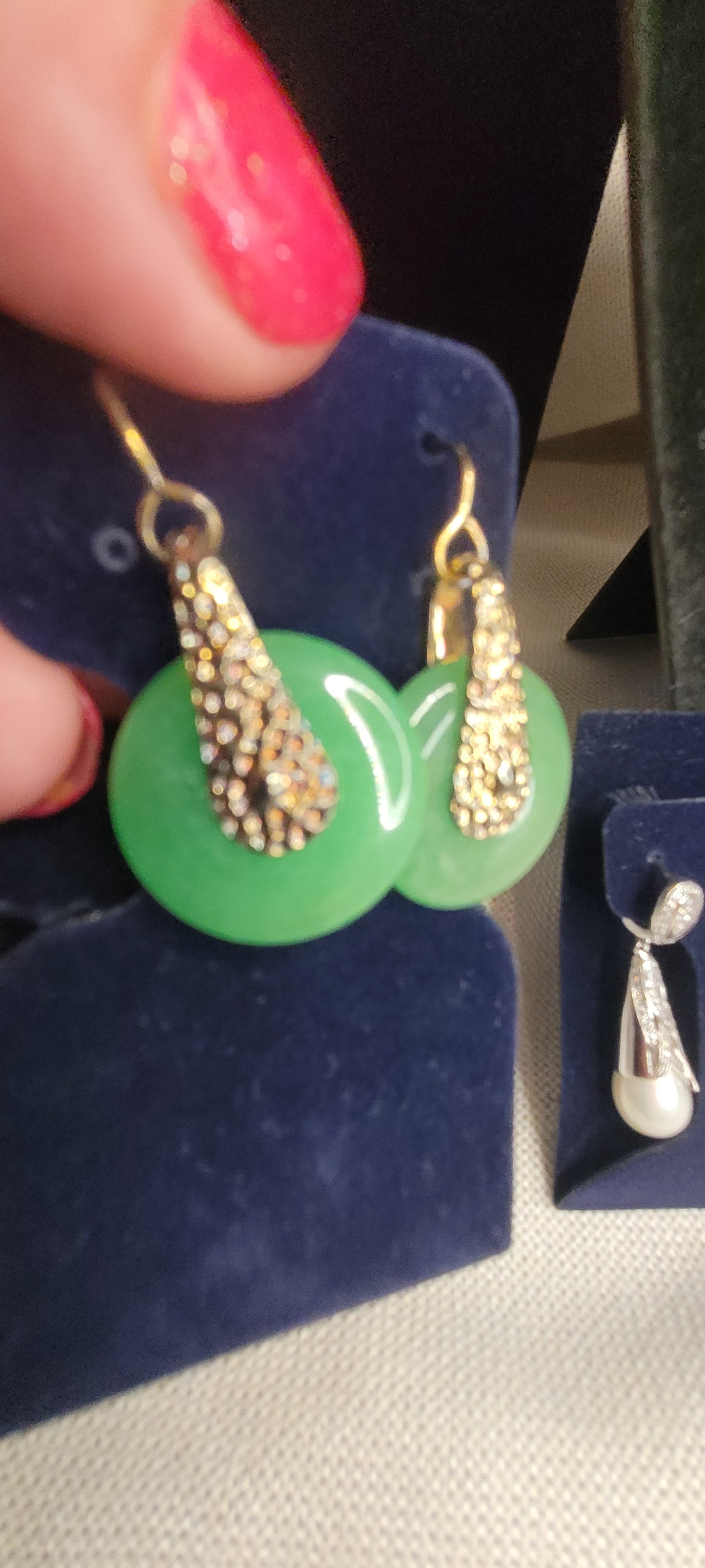 Jade and gold tone earrings